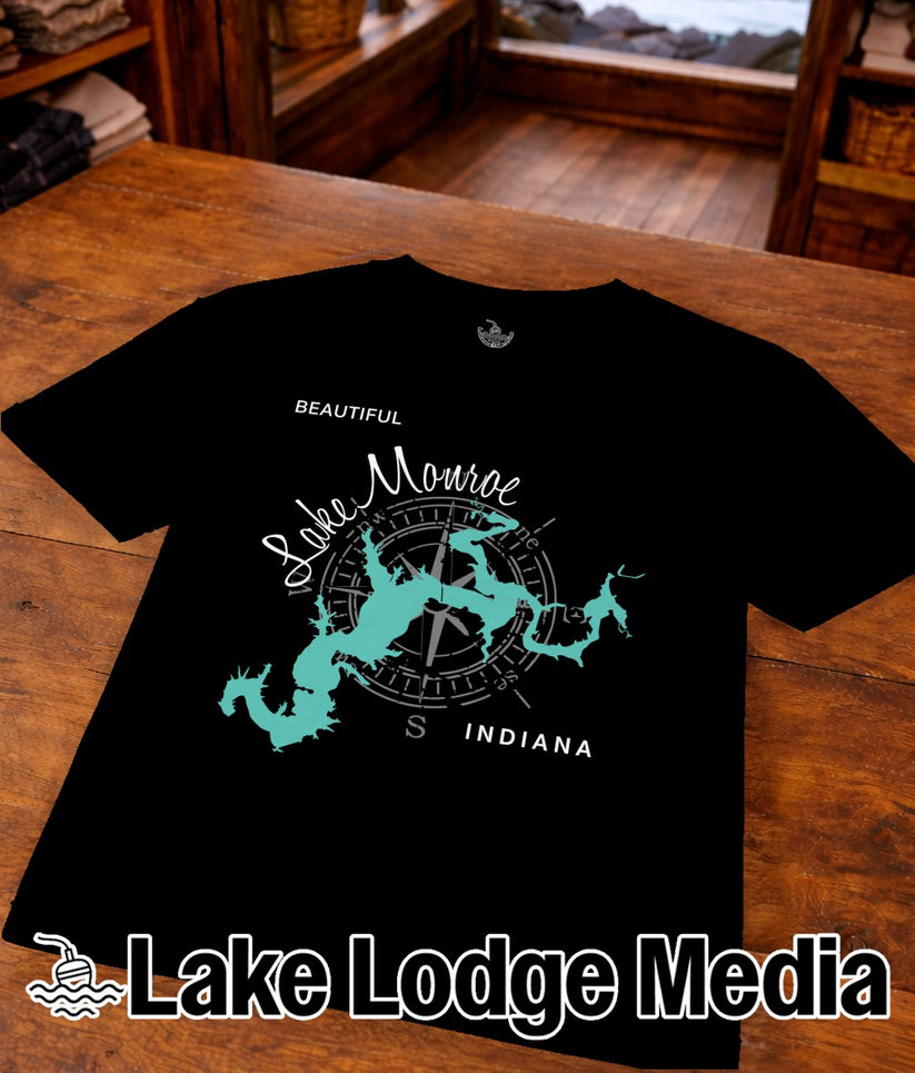Black t-shirt with turquoise graphic of Lake Monroe, Indiana and compass rose.