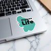 "Ossipee Life" sticker on a laptop keyboard.