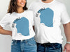 White t-shirts with blue Red Lake Minnesota map graphic and text.