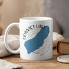 White mug with Convict Lake California design and compass rose.