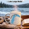 White mug with Grand Lake Colorado map and compass on a rainy day.