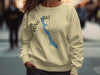Light yellow crewneck sweatshirt with a blue map of Long Lake, Maine and compass design.