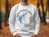 White sweatshirt with New Hogan Lake California graphic and compass design.