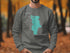 Grey sweatshirt with teal outline of Lake Piru and "CALIFORNIA".