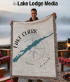 Woven blanket with Lake Clark Alaska map design and compass rose.