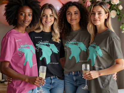 Four women model t-shirts with "Beautiful Lake Huron Michigan" map graphic.