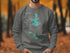Gray sweatshirt with "Beautiful Lake Disharoon Georgia" and compass design.