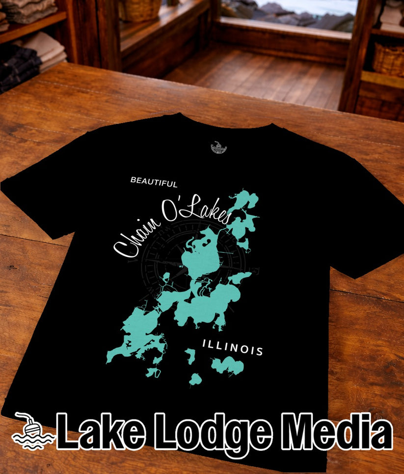 Black t-shirt with teal map of Chain O'Lakes and "Lake Lodge Media" text.