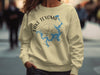 Light yellow sweatshirt with Lake Texoma Texas map and compass graphic.