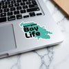 Georgian Bay Life sticker on a laptop keyboard over a marble surface.