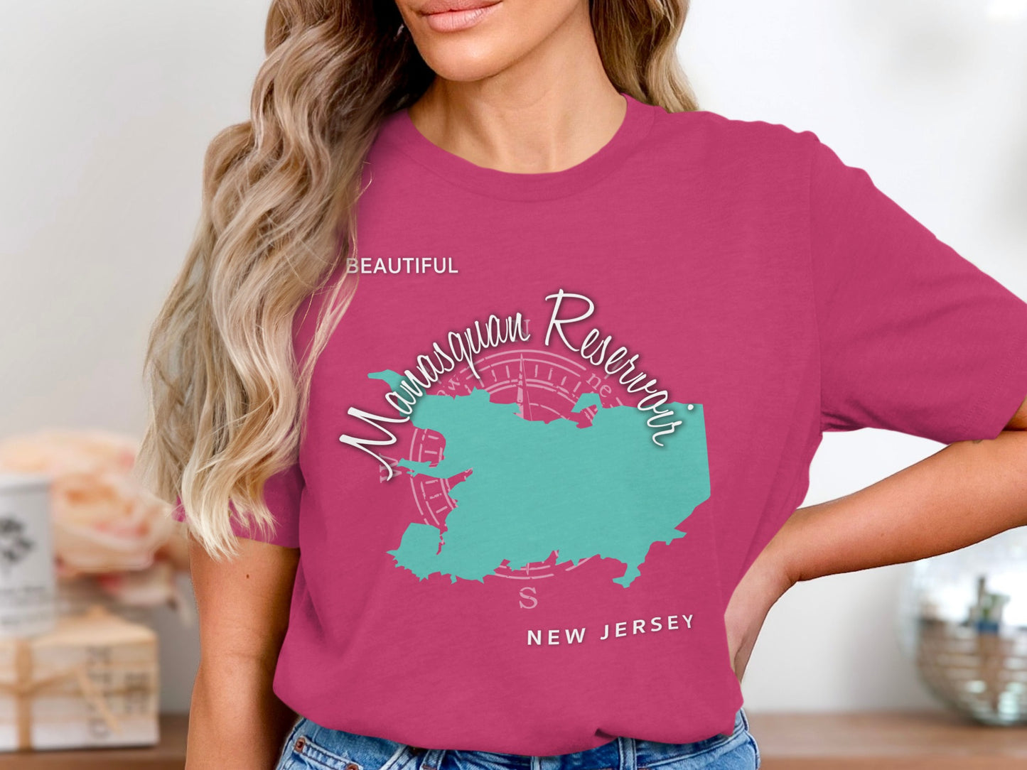 Woman wearing dark pink t-shirt with Manasquan Reservoir map and "NEW JERSEY"