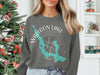 Dark grey crewneck sweatshirt with Waloon Lake Michigan map and compass graphic.