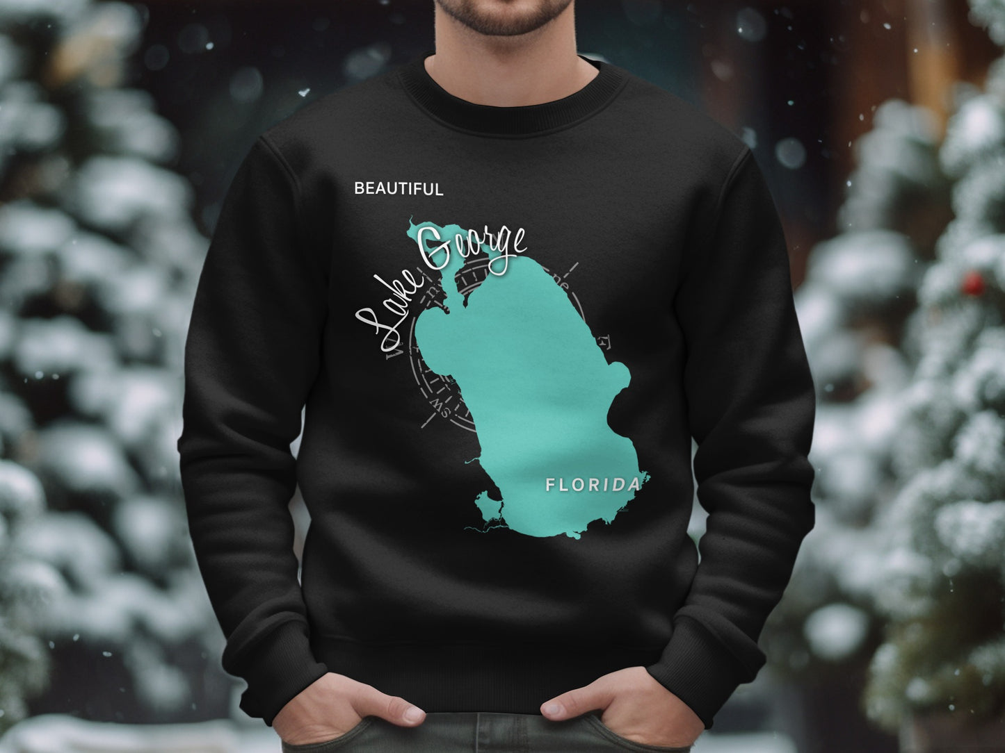 Black sweatshirt with teal Lake George, Florida map graphic and compass rose.