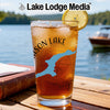 Glass of iced tea with "Hudson Lake" and compass graphic, by Lake Lodge Media.