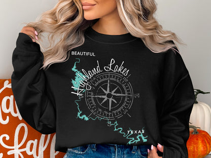 Black sweatshirt with a "Beautiful Highland Lakes Texas" map and compass graphic.