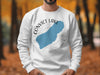 White sweatshirt with Convict Lake California design and compass rose.