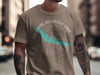 Taupe t-shirt with Theodore Roosevelt Lake map and compass graphic.