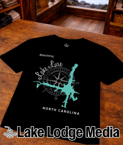 Black t-shirt with "Beautiful Lake Lure North Carolina" and compass graphic.
