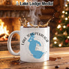 White mug with blue Lake Tohopekaliga Florida map design, steaming coffee splashing.