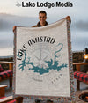 Woven blanket featuring the Lake Amistad map, Texas, and compass design.