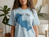 Light blue t-shirt with Sandhill Lake, Wisconsin text and map graphic.