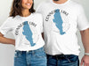 White t-shirts with Conneaut Lake map and compass design.