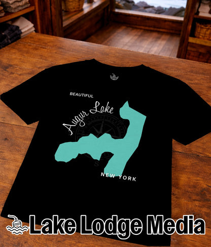 Black t-shirt with teal outline of Augur Lake and compass rose, "NEW YORK" text.