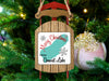 Sled ornament with "Merry Christmas FROM Convivt Lake" text and snowflakes.