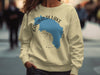 Yellow sweatshirt with Garibaldi Lake map and compass graphic, "BRITISH COLUMBIA."
