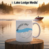 White mug with Donner Lake map and compass graphic on misty lake background.