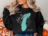 Black sweatshirt with turquoise outline of Indiana and text "Beautiful Lake Michigan Indiana".