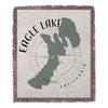 Woven blanket with Eagle Lake map outline, compass rose, and text.