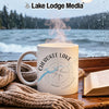 White mug with "Cherokee Lake Tennessee" text and compass design.