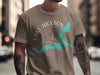 Brown t-shirt with navy compass graphic and "Lake Jackson Georgia" text.