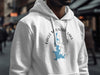 White hoodie with Eagle Mountain Lake, Texas compass graphic and map detail.