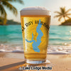 Glass of beer with Lake Ray Hubbard map and "Lake Lodge Media" logo on beach.