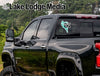 Black truck with "Merced Life" decal on the rear window.