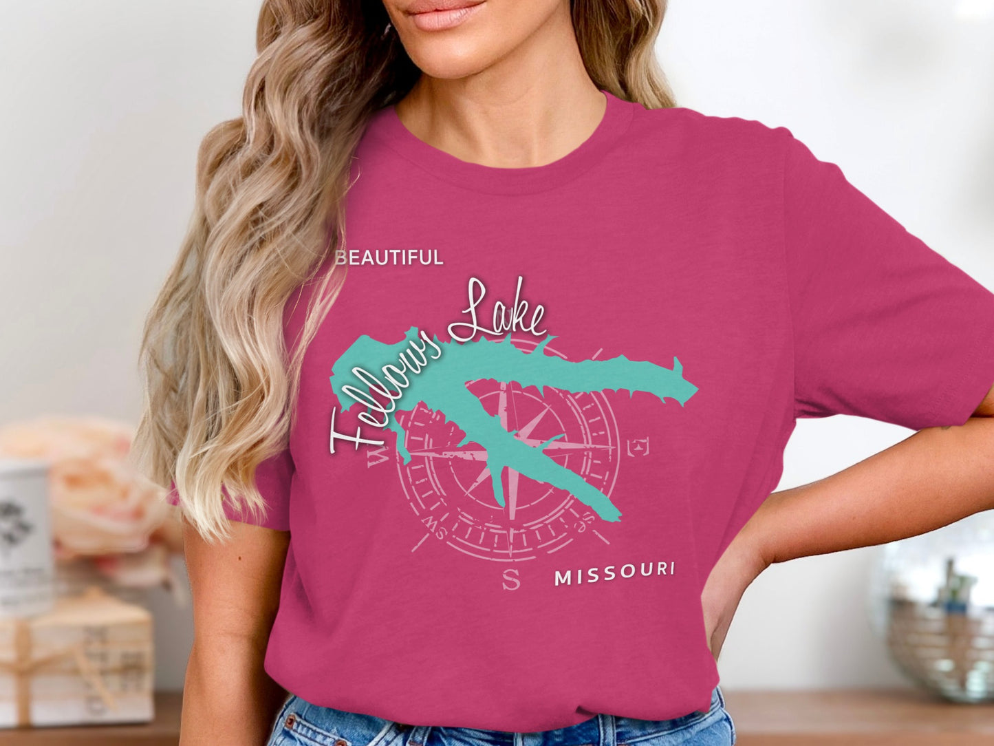 Pink t-shirt with "Beautiful Fellows Lake Missouri" text and compass rose graphic.