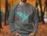Gray sweatshirt featuring a teal map outline of Lake Siskiyou, California.