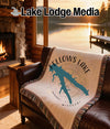 Beige woven blanket with "Fellows Lake Missouri" map design and compass rose.