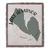 Woven blanket with Lake Almanor map outline, compass rose, and text.
