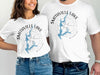 White t-shirts with "Smithville Lake Missouri" and compass design.