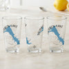 Three clear glasses with a blue map of Hudson Lake, Oklahoma, and compass rose graphic.