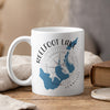 White mug with Reel Foot Lake map, compass, and "TENNESSEE" text.