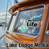Harden Life sticker on a boat window with Lake Lodge Media text and logo.
