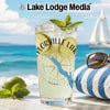 Glass with refreshing drink, lime, mint, and Lake Lodge Media logo.
