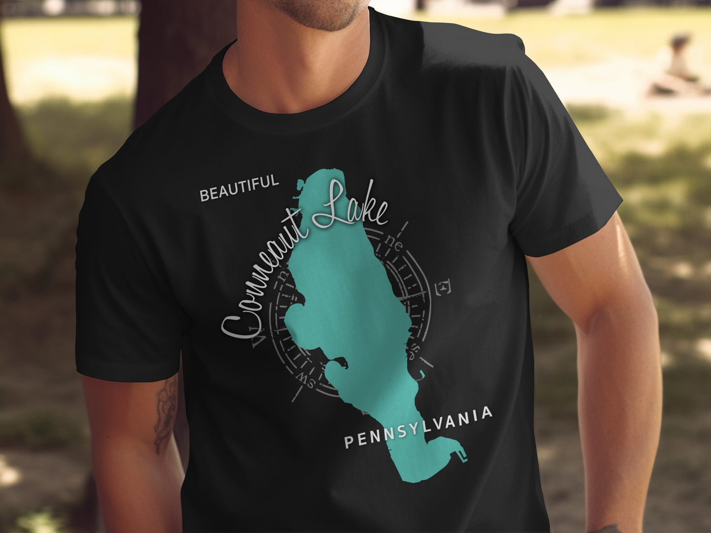 Black t-shirt with a teal map of Conneaut Lake, Pennsylvania.