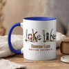 White mug with blue interior and handle, featuring "Lake Life" artwork and "Shuswap Lake British Columbia" text.
