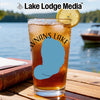 Glass of iced tea with "Wnans Lake" graphic on a wooden table.