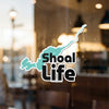 Shoal Life sticker with teal lake shape over black text and white border.